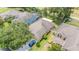 Aerial view showcasing the home's position in a residential neighborhood at 30308 Cheval St, Mount Dora, FL 32757