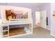 Bedroom with decor with white bunk beds and carpeted flooring at 30308 Cheval St, Mount Dora, FL 32757