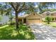 Charming single-Gathering home features a well-manicured lawn and a two-car garage at 30308 Cheval St, Mount Dora, FL 32757