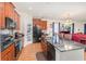 Stylish kitchen with dark granite counters at 30308 Cheval St, Mount Dora, FL 32757