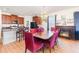 Open-concept kitchen offers stainless appliances and dark granite counters at 30308 Cheval St, Mount Dora, FL 32757