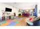 Open-concept living area with wood floors and lots of space to entertain at 30308 Cheval St, Mount Dora, FL 32757