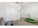 Bedroom featuring a futon, a trampoline and closet doors at 3142 Hill Point St, Minneola, FL 34715