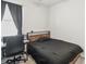 Bedroom featuring a desk, a window and a bed at 3142 Hill Point St, Minneola, FL 34715
