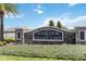 Elegant community sign 'The Overlook at Grassy Lake' surrounded by landscaping, creating an inviting entrance at 3142 Hill Point St, Minneola, FL 34715