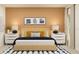 Warm bedroom with decorative pillows, complementing artwork, and white nightstands flanking the bed at 431 Puma Loop, Groveland, FL 34736