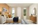 Stylish bedroom features ample natural light, coordinated decor, and a comfortable bed setting at 431 Puma Loop, Groveland, FL 34736