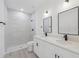 Bathroom featuring double sinks, sleek fixtures, and a spacious shower at 4572 Sw 149Th St, Ocala, FL 34473