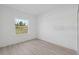 The bedroom is bathed in natural light, highlighting its spacious feel at 4572 Sw 149Th St, Ocala, FL 34473