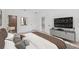 Spacious bedroom with neutral tones, walk-in closet, and seamlessly connected ensuite bathroom at 4572 Sw 149Th St, Ocala, FL 34473