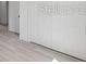 Bright hallway features neutral walls and wood-look flooring at 4572 Sw 149Th St, Ocala, FL 34473