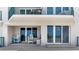 Spacious condo balcony with seating areas and direct ocean views at 4631 S Atlantic Ave # 8102, Port Orange, FL 32127