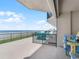 Spacious balcony with ocean views and outdoor seating at 4631 S Atlantic Ave # 8102, Port Orange, FL 32127