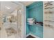 Bathroom and closet space with a double vanity and ample storage at 4631 S Atlantic Ave # 8102, Port Orange, FL 32127