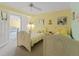 Inviting bedroom features two beds and opens to living area at 4631 S Atlantic Ave # 8102, Port Orange, FL 32127