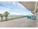 Wide condo balcony with ocean views, perfect for enjoying the sunset and outdoor living at 4631 S Atlantic Ave # 8102, Port Orange, FL 32127