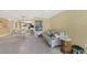 Open concept living room and dining area with comfortable seating and stylish decor at 4631 S Atlantic Ave # 8102, Port Orange, FL 32127