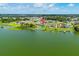 Panoramic aerial view of lakeside homes, showcasing private docks and serene waterfront living at 5005 Shore Side Dr, Lakeland, FL 33812