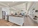 Spacious kitchen with white cabinets and a stainless steel refrigerator at 5005 Shore Side Dr, Lakeland, FL 33812