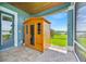 Enjoy a wooden sauna on the patio, offering a private retreat with views of the lake at 5005 Shore Side Dr, Lakeland, FL 33812