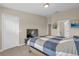 Well-lit bedroom with a TV and neutral decor provides a serene and inviting space at 517 Wilton Cir, Sanford, FL 32773