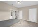 Bedroom with neutral walls, carpet flooring, two closets, and bathroom access at 517 Wilton Cir, Sanford, FL 32773