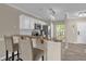 Stylish kitchen with breakfast bar, granite countertops, and stainless steel appliances at 517 Wilton Cir, Sanford, FL 32773
