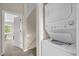Convenient in-unit laundry area with stacked washer and dryer for efficient space-saving at 517 Wilton Cir, Sanford, FL 32773