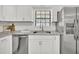 Kitchen featuring stainless steel appliances, granite countertops, and white cabinetry at 5460 Se 28Th St, Ocala, FL 34480