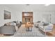 Inviting living room features a brick fireplace and modern seating at 5460 Se 28Th St, Ocala, FL 34480