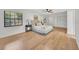 Main bedroom features a ceiling fan, and two large windows at 5460 Se 28Th St, Ocala, FL 34480