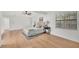 Main bedroom features a ceiling fan, and two large windows at 5460 Se 28Th St, Ocala, FL 34480