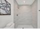 Bathroom shower features gray tiled walls, and a tiled shower floor at 5460 Se 28Th St, Ocala, FL 34480
