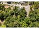 Aerial view of the home highlighting its landscaping and proximity to neighborhood streets at 600 Plum Ln, Altamonte Springs, FL 32701