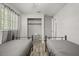 Bedroom features twin beds, window with natural light, and closet at 600 Plum Ln, Altamonte Springs, FL 32701