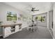 Cozy dining area featuring a farmhouse-style table with chairs and natural light at 600 Plum Ln, Altamonte Springs, FL 32701