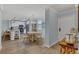 Bright dining area adjacent to the kitchen with views of the front door entrance at 690 Osceola Ave # 410, Winter Park, FL 32789