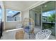Relaxing balcony area features seating and views at 7613 Wandering Way, Orlando, FL 32836