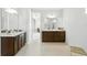 Spacious bathroom boasts double vanity, and neutral tones at 7613 Wandering Way, Orlando, FL 32836