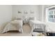 Charming bedroom featuring twin beds, soft decor, and a cozy, welcoming atmosphere at 7613 Wandering Way, Orlando, FL 32836