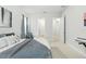 Bright bedroom with a comfy bed and stylish furniture, neutral color palette, and inviting atmosphere at 7613 Wandering Way, Orlando, FL 32836