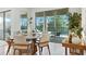 Bright dining area with view of the pool through large sliding glass doors at 7613 Wandering Way, Orlando, FL 32836