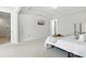 Bright main bedroom with ensuite bathroom and television at 7613 Wandering Way, Orlando, FL 32836