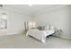 Bright main bedroom boasts tray ceiling and ample space at 7613 Wandering Way, Orlando, FL 32836