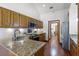 Well-equipped kitchen with granite countertops, stainless steel appliances, and ample cabinet space at 8665 Vista Point Cv, Orlando, FL 32836