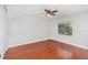Bedroom featuring wood-look floors, ceiling fan, and window at 917 Great Bend Rd, Altamonte Springs, FL 32714
