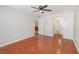 Bedroom featuring wood-look floors, ceiling fan, and ample natural light at 917 Great Bend Rd, Altamonte Springs, FL 32714