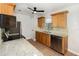 Updated kitchen featuring stainless steel appliances, light wood cabinets, granite countertops and tile floors at 917 Great Bend Rd, Altamonte Springs, FL 32714