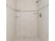 Bathroom shower boasting decorative tile and glass shelving at 917 Great Bend Rd, Altamonte Springs, FL 32714