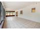 Bright sunroom featuring tile flooring, wood accents, and lots of natural light at 917 Great Bend Rd, Altamonte Springs, FL 32714